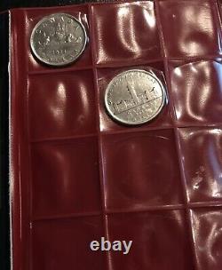 Canadian Silver Dollars 1935-1957. 8 coins in total in Vintage Collector Sleeve