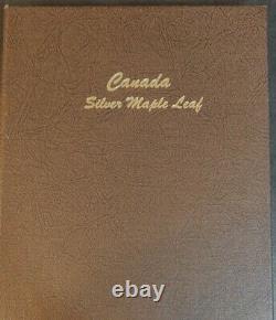 Lot of 31 1988-2020 $5 1 oz Canadian Silver Maple Leaf Coins withDansco album