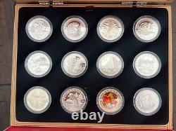 2013 Oh! Canada Ensemble de 12 pièces de monnaie en argent fin de 10 $ avec boîte originale