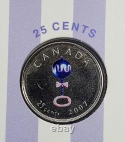 Ensemble de bébés nés en 2007 au Canada, comprenant un hochet et une série de pièces de monnaie